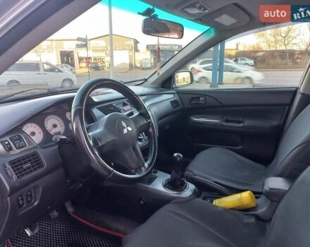 Серый Мицубиси Лансер, объемом двигателя 1.6 л и пробегом 228 тыс. км за 2999 $, фото 23 на Automoto.ua