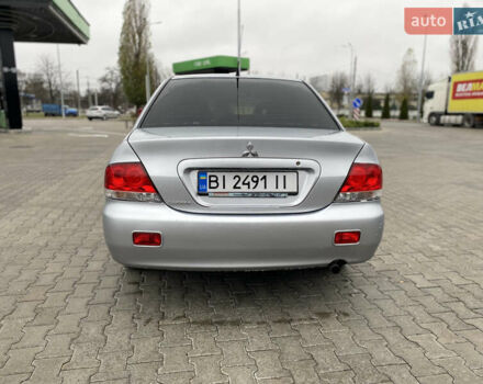 Сірий Міцубісі Lancer, об'ємом двигуна 1.58 л та пробігом 280 тис. км за 4650 $, фото 4 на Automoto.ua