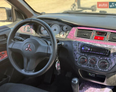 Сірий Міцубісі Lancer, об'ємом двигуна 1.6 л та пробігом 337 тис. км за 4500 $, фото 10 на Automoto.ua