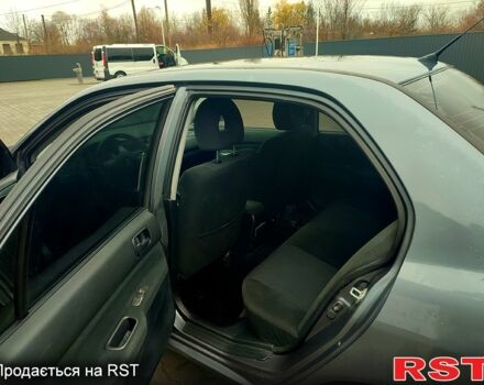 Сірий Міцубісі Lancer, об'ємом двигуна 1.6 л та пробігом 197 тис. км за 3600 $, фото 6 на Automoto.ua