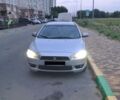 Серый Мицубиси Лансер, объемом двигателя 1.5 л и пробегом 244 тыс. км за 5600 $, фото 1 на Automoto.ua