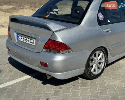Сірий Міцубісі Lancer, об'ємом двигуна 1.6 л та пробігом 337 тис. км за 4500 $, фото 8 на Automoto.ua