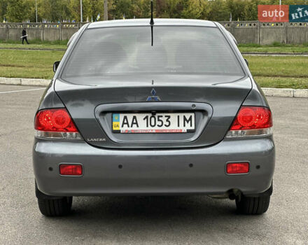 Сірий Міцубісі Lancer, об'ємом двигуна 1.58 л та пробігом 94 тис. км за 6500 $, фото 1 на Automoto.ua