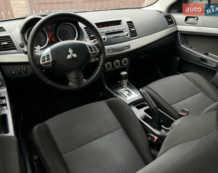 Сірий Міцубісі Lancer, об'ємом двигуна 2 л та пробігом 226 тис. км за 7600 $, фото 6 на Automoto.ua