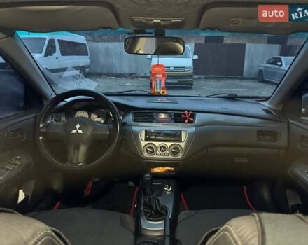 Серый Мицубиси Лансер, объемом двигателя 1.58 л и пробегом 227 тыс. км за 3200 $, фото 7 на Automoto.ua