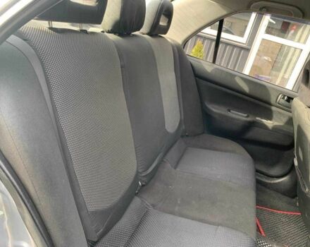 Серый Мицубиси Лансер, объемом двигателя 1.6 л и пробегом 227 тыс. км за 3599 $, фото 17 на Automoto.ua