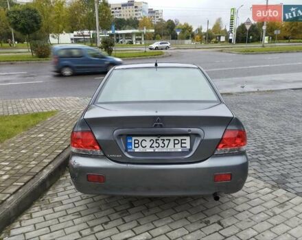 Сірий Міцубісі Lancer, об'ємом двигуна 1.58 л та пробігом 209 тис. км за 2900 $, фото 9 на Automoto.ua