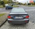 Сірий Міцубісі Lancer, об'ємом двигуна 1.58 л та пробігом 209 тис. км за 2900 $, фото 9 на Automoto.ua