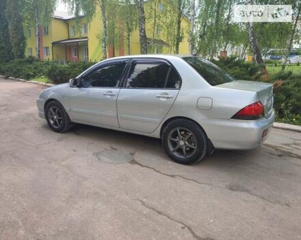 Сірий Міцубісі Lancer, об'ємом двигуна 1.6 л та пробігом 180 тис. км за 5350 $, фото 9 на Automoto.ua