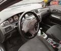 Сірий Міцубісі Lancer, об'ємом двигуна 1.58 л та пробігом 209 тис. км за 2900 $, фото 14 на Automoto.ua