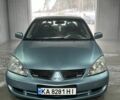Сірий Міцубісі Lancer, об'ємом двигуна 1.6 л та пробігом 280 тис. км за 7700 $, фото 1 на Automoto.ua
