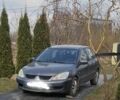 Серый Мицубиси Лансер, объемом двигателя 1.6 л и пробегом 460 тыс. км за 3492 $, фото 1 на Automoto.ua