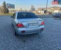 Серый Мицубиси Лансер, объемом двигателя 1.6 л и пробегом 228 тыс. км за 2950 $, фото 9 на Automoto.ua