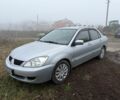 Сірий Міцубісі Lancer, об'ємом двигуна 1.6 л та пробігом 230 тис. км за 3400 $, фото 1 на Automoto.ua