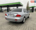 Сірий Міцубісі Lancer, об'ємом двигуна 1.58 л та пробігом 280 тис. км за 4650 $, фото 5 на Automoto.ua