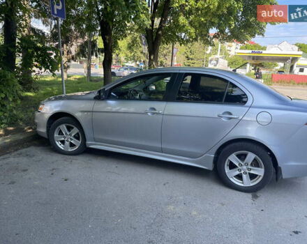 Серый Мицубиси Лансер, объемом двигателя 2 л и пробегом 143 тыс. км за 6850 $, фото 2 на Automoto.ua