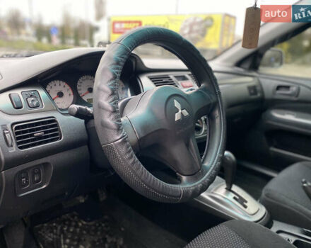 Сірий Міцубісі Lancer, об'ємом двигуна 1.58 л та пробігом 280 тис. км за 4650 $, фото 11 на Automoto.ua