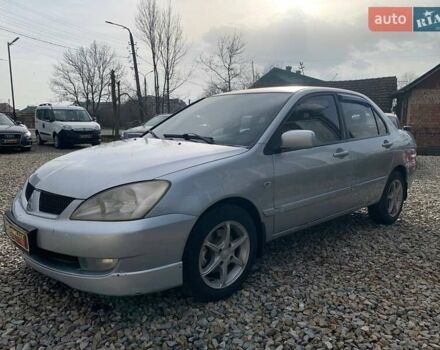 Серый Мицубиси Лансер, объемом двигателя 1.58 л и пробегом 227 тыс. км за 3599 $, фото 7 на Automoto.ua