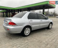 Сірий Міцубісі Lancer, об'ємом двигуна 1.58 л та пробігом 280 тис. км за 4650 $, фото 6 на Automoto.ua