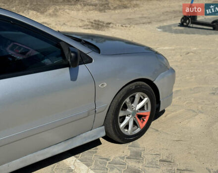 Сірий Міцубісі Lancer, об'ємом двигуна 1.6 л та пробігом 337 тис. км за 4500 $, фото 1 на Automoto.ua