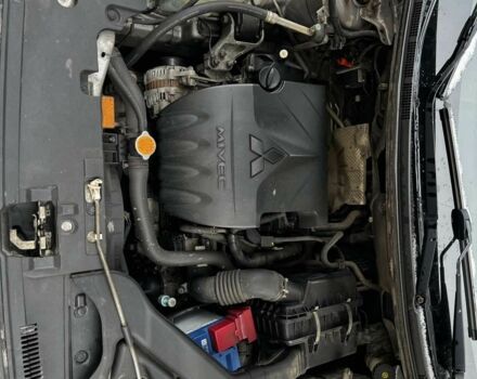 Серый Мицубиси Лансер, объемом двигателя 1.5 л и пробегом 170 тыс. км за 9000 $, фото 3 на Automoto.ua