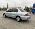 Сірий Міцубісі Lancer, об'ємом двигуна 1.6 л та пробігом 240 тис. км за 4650 $, фото 4 на Automoto.ua
