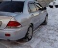 Серый Мицубиси Лансер, объемом двигателя 1.6 л и пробегом 180 тыс. км за 4750 $, фото 6 на Automoto.ua