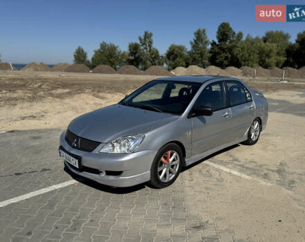 Сірий Міцубісі Lancer, об'ємом двигуна 1.6 л та пробігом 337 тис. км за 4500 $, фото 4 на Automoto.ua