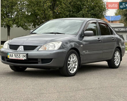 Сірий Міцубісі Lancer, об'ємом двигуна 1.58 л та пробігом 94 тис. км за 6500 $, фото 8 на Automoto.ua