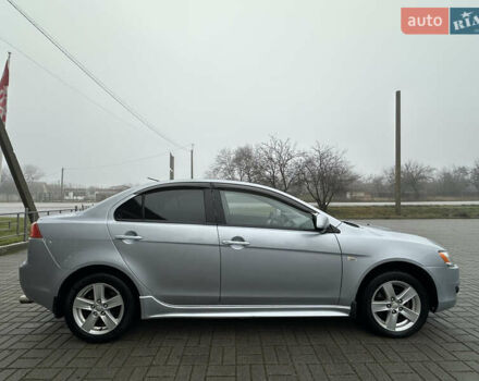 Серый Мицубиси Лансер, объемом двигателя 2 л и пробегом 279 тыс. км за 4999 $, фото 7 на Automoto.ua