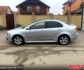 Серый Мицубиси Лансер, объемом двигателя 2 л и пробегом 297 тыс. км за 4500 $, фото 1 на Automoto.ua