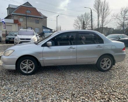 Серый Мицубиси Лансер, объемом двигателя 1.6 л и пробегом 227 тыс. км за 3599 $, фото 6 на Automoto.ua