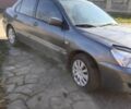 Серый Мицубиси Лансер, объемом двигателя 1.6 л и пробегом 153 тыс. км за 5600 $, фото 5 на Automoto.ua