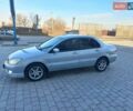 Серый Мицубиси Лансер, объемом двигателя 1.58 л и пробегом 228 тыс. км за 3600 $, фото 24 на Automoto.ua