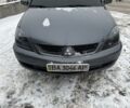 Сірий Міцубісі Lancer, об'ємом двигуна 1.58 л та пробігом 119 тис. км за 7200 $, фото 1 на Automoto.ua