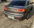 Сірий Міцубісі Lancer, об'ємом двигуна 1.5 л та пробігом 236 тис. км за 6000 $, фото 4 на Automoto.ua