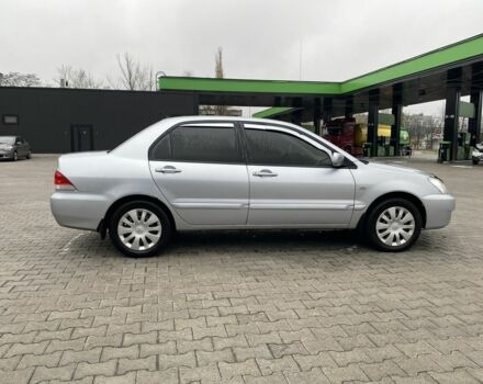 Сірий Міцубісі Lancer, об'ємом двигуна 1.6 л та пробігом 240 тис. км за 4650 $, фото 8 на Automoto.ua