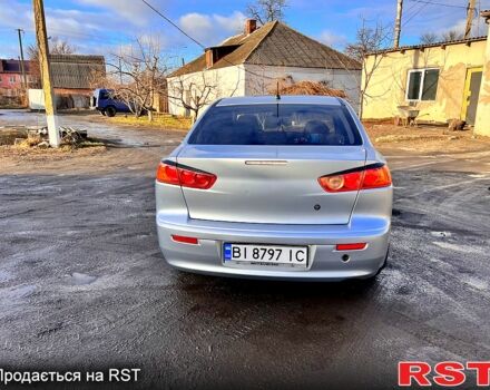 Сірий Міцубісі Lancer, об'ємом двигуна 1.5 л та пробігом 161 тис. км за 7000 $, фото 3 на Automoto.ua