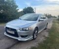 Сірий Міцубісі Lancer, об'ємом двигуна 2 л та пробігом 255 тис. км за 7016 $, фото 1 на Automoto.ua