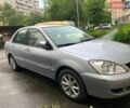 Сірий Міцубісі Lancer, об'ємом двигуна 1.58 л та пробігом 75 тис. км за 5600 $, фото 1 на Automoto.ua