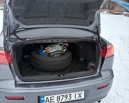 Серый Мицубиси Лансер, объемом двигателя 2 л и пробегом 187 тыс. км за 7000 $, фото 11 на Automoto.ua