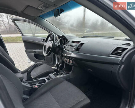 Серый Мицубиси Лансер, объемом двигателя 2 л и пробегом 279 тыс. км за 4999 $, фото 22 на Automoto.ua