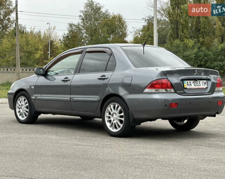 Сірий Міцубісі Lancer, об'ємом двигуна 1.58 л та пробігом 94 тис. км за 6500 $, фото 6 на Automoto.ua
