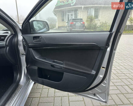 Серый Мицубиси Лансер, объемом двигателя 2 л и пробегом 279 тыс. км за 4999 $, фото 21 на Automoto.ua