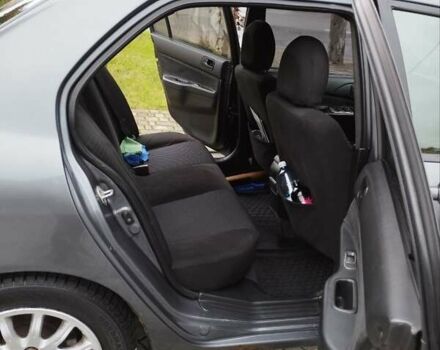 Сірий Міцубісі Lancer, об'ємом двигуна 1.58 л та пробігом 209 тис. км за 2900 $, фото 10 на Automoto.ua