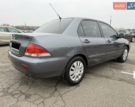 Сірий Міцубісі Lancer, об'ємом двигуна 0 л та пробігом 62 тис. км за 7250 $, фото 2 на Automoto.ua