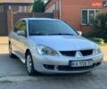 Сірий Міцубісі Lancer, об'ємом двигуна 1.58 л та пробігом 299 тис. км за 3950 $, фото 1 на Automoto.ua