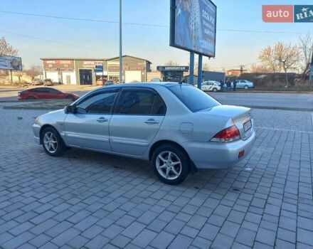 Серый Мицубиси Лансер, объемом двигателя 1.6 л и пробегом 228 тыс. км за 2999 $, фото 18 на Automoto.ua