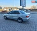 Серый Мицубиси Лансер, объемом двигателя 1.6 л и пробегом 228 тыс. км за 2999 $, фото 18 на Automoto.ua