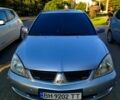Сірий Міцубісі Lancer, об'ємом двигуна 1.6 л та пробігом 300 тис. км за 4300 $, фото 1 на Automoto.ua